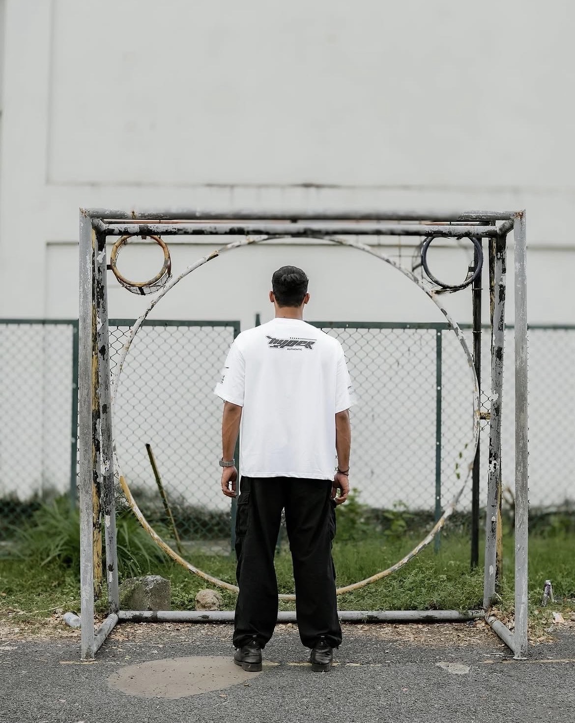 Teesphere lookbook — model standing in front of an archway